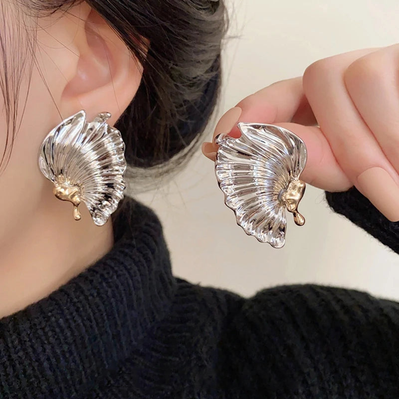 Boucles d'oreilles exquises exagérées