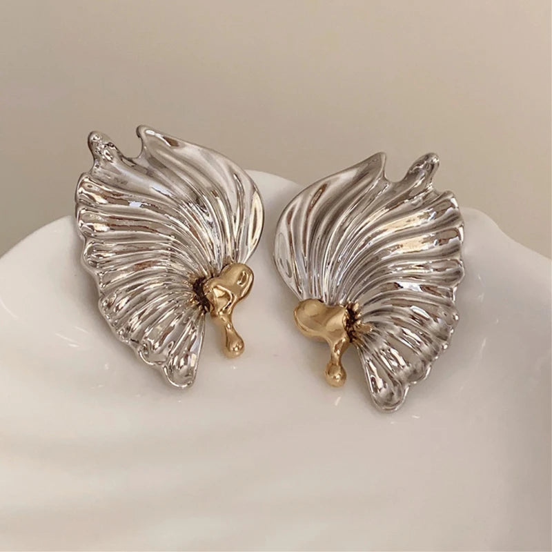 Boucles d'oreilles exquises exagérées