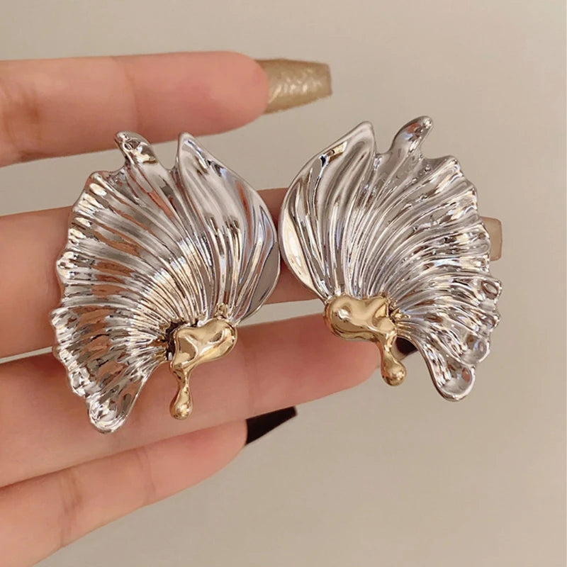 Boucles d'oreilles exquises exagérées