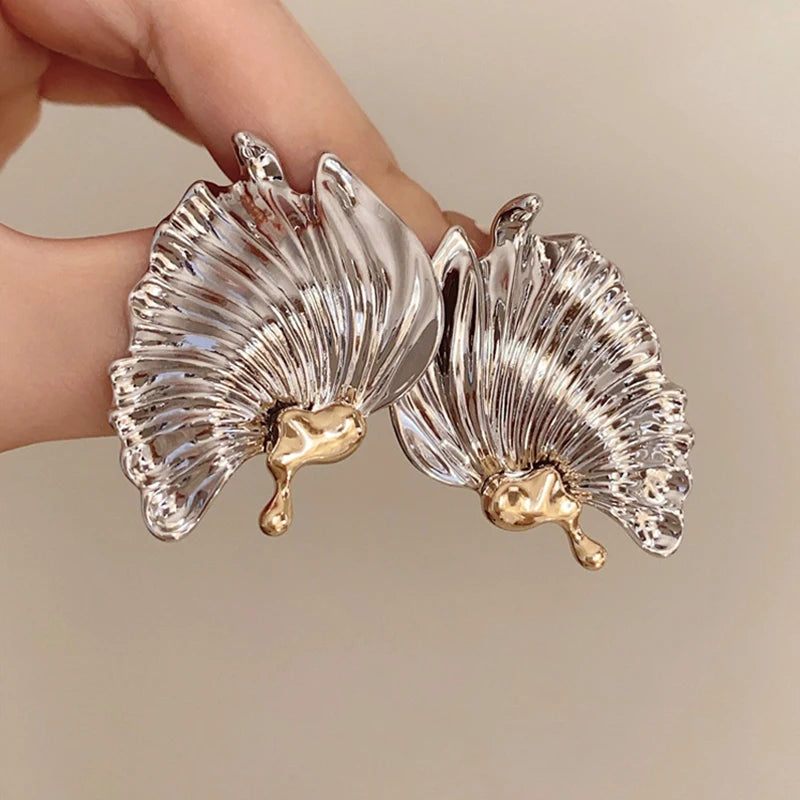 Boucles d'oreilles exquises exagérées
