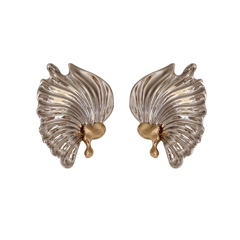 Boucles d'oreilles exquises exagérées