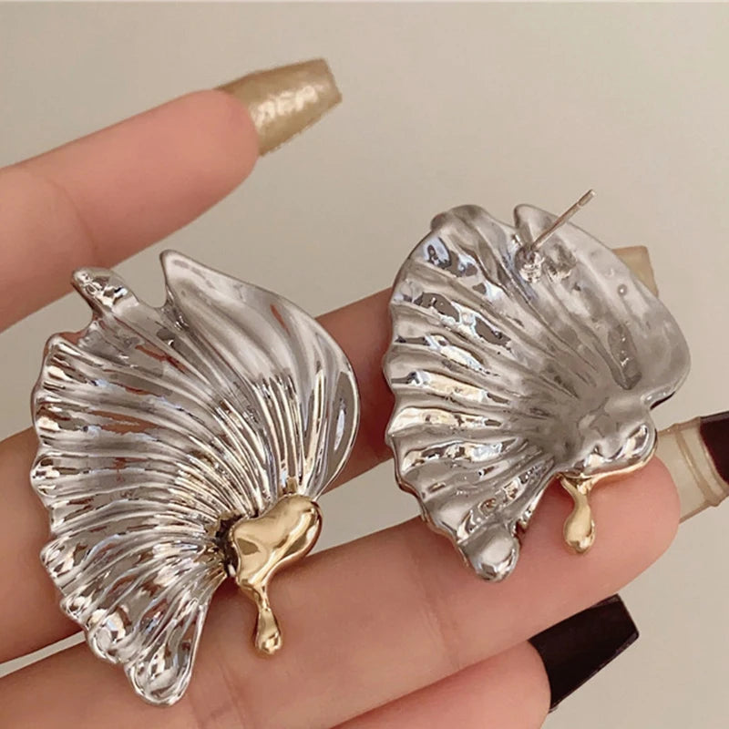 Boucles d'oreilles exquises exagérées